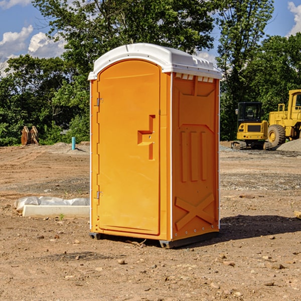 what is the cost difference between standard and deluxe portable toilet rentals in Mapleton